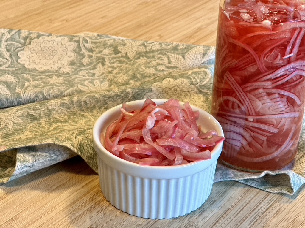 pickled red onion in bowl